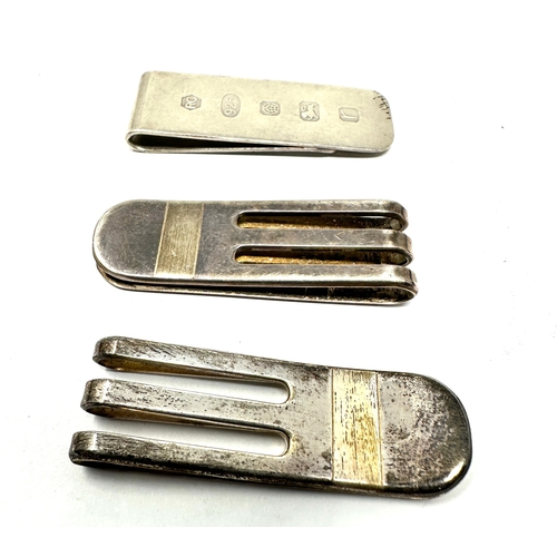 66 - 3 silver money clips