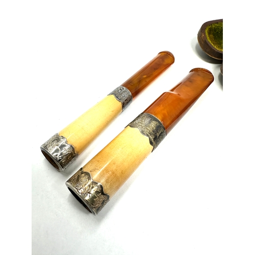 26 - 2 cased antique amber & silver collar cheroot holders