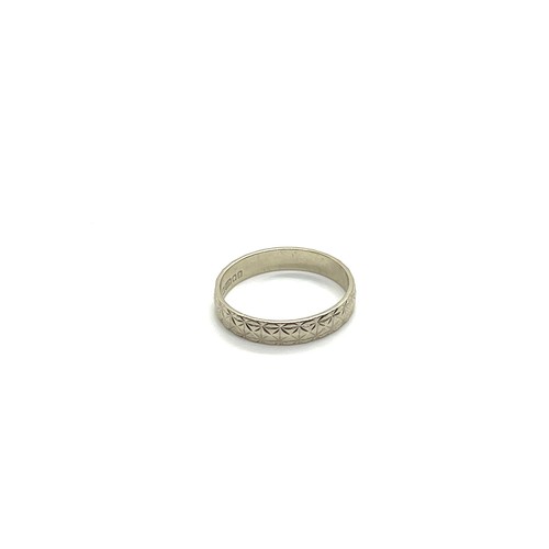 501 - 9ct white gold ladies wedding band, ring size H, approximate weight 1.1