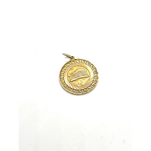 485 - 14ct gold pendant, Colosseum design, diameter of pendant 2.5cm, overall weight 3.2g