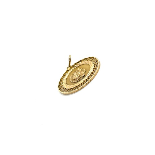 485 - 14ct gold pendant, Colosseum design, diameter of pendant 2.5cm, overall weight 3.2g