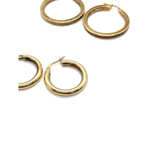 486 - 2 pairs of ladies 9ct gold hoop earrings, total overall weight 3.2g