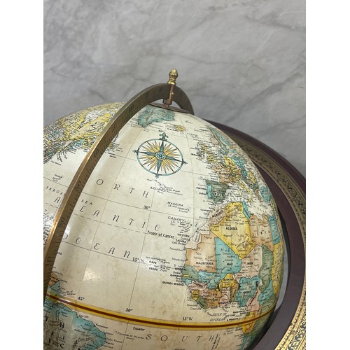 312 - Globe on mahogany and brass stand in lovely condition overall height 38 inches tall