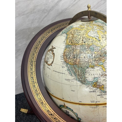 312 - Globe on mahogany and brass stand in lovely condition overall height 38 inches tall