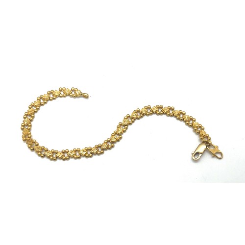 508 - 22ct gold ladies bracelet, with a repaired clasp which is 9ct gold, overall weight 12.4g, length 20c... 