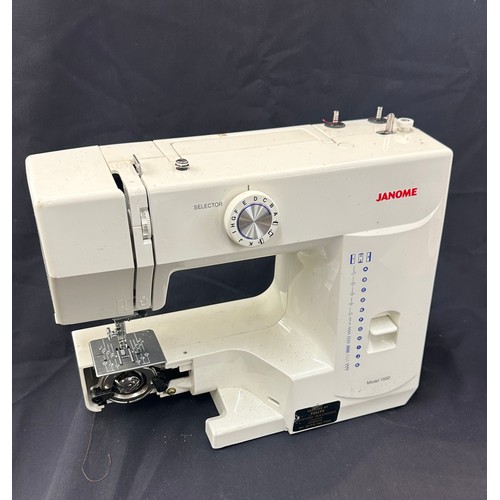 232 - Janome sewing machine and accessories