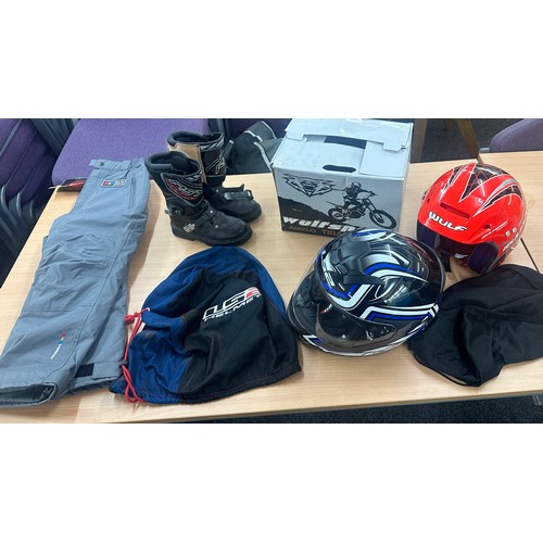 228 - Selection of motorbike accessories includes boots Helmets, trousers etc