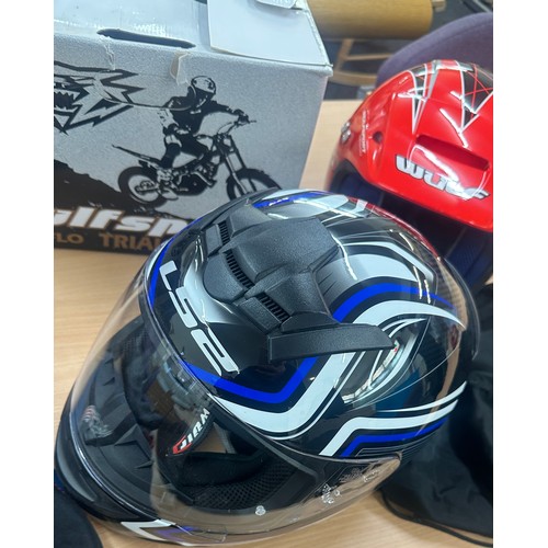 228 - Selection of motorbike accessories includes boots Helmets, trousers etc