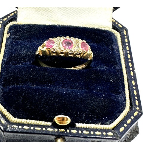 114 - 9ct gold diamond & ruby  ring (1.9g)