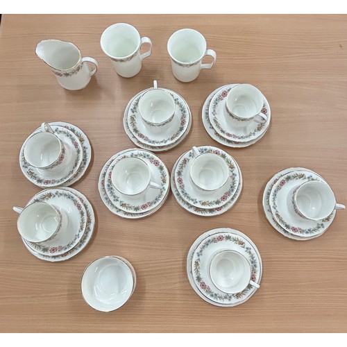 557 - Royal Albert Paragon Belinda part tea service to include cups, saucers, milk jug etc