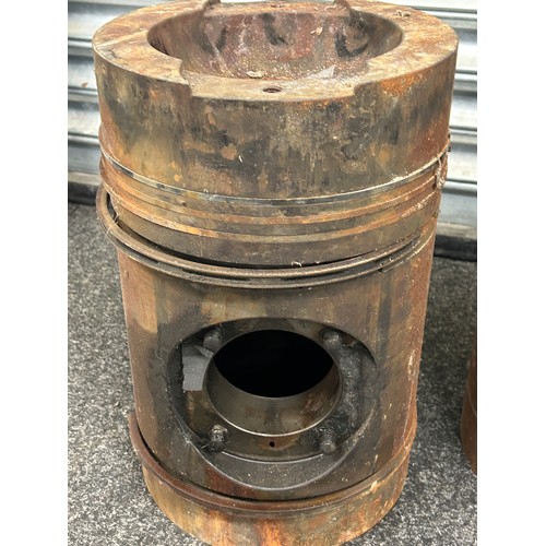 243 - Pair of large engine pistons measures approx 15.5 inches tall by 10 inches wide