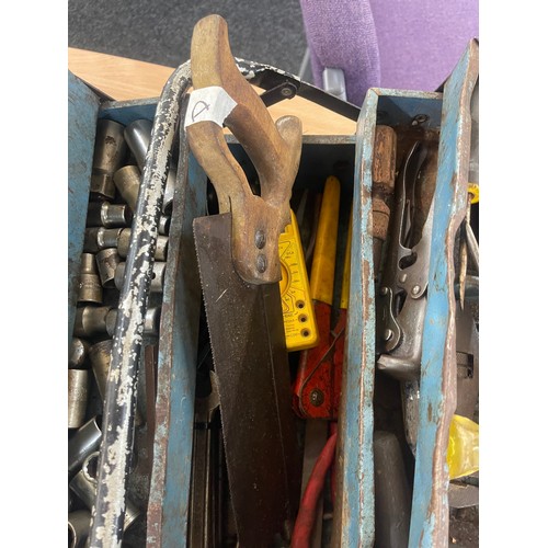 253 - Metal tool box and contents includes saws, screw drivers etc