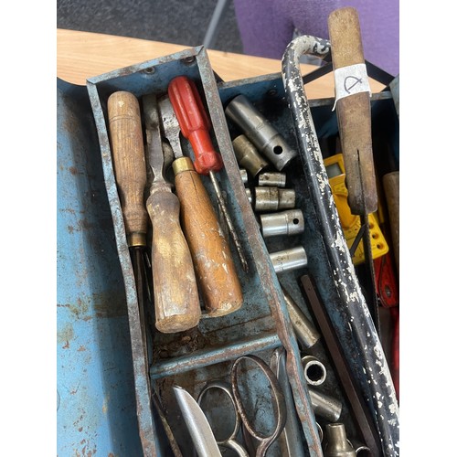 253 - Metal tool box and contents includes saws, screw drivers etc