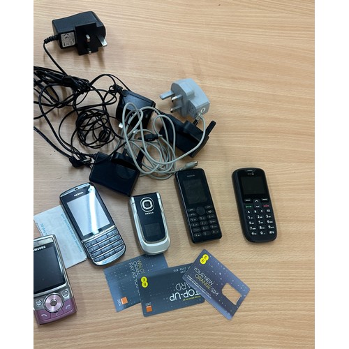 68 - Selection of vintage phones and chargers