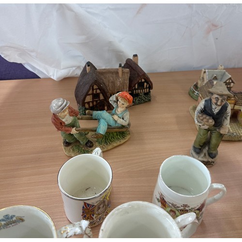 217 - Selection of collectable pieces to include cottages, poole bird, Royal Coronation, Royal Adderly etc