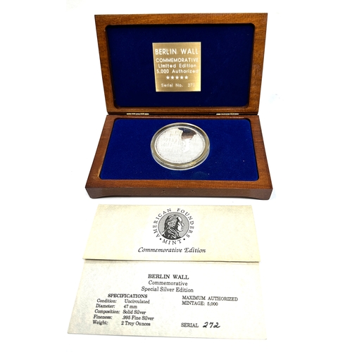 10 - Boxed Berlin wall commemorative silver medallion limited edition 995 fine silver 2 troy ounces c.o.a