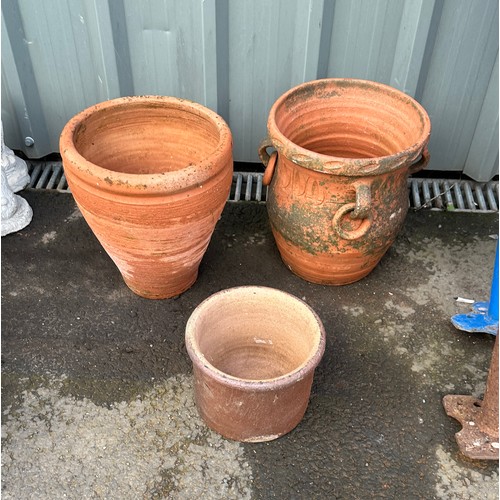 100V - three terracotta plant pots largest measures approx 12 inches tall by 11 inches diameter