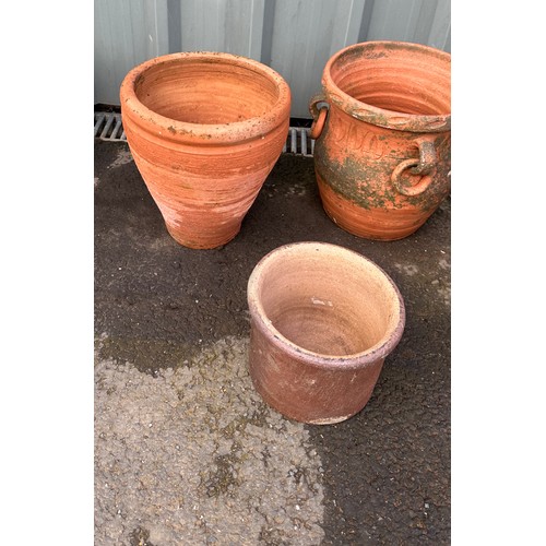 100V - three terracotta plant pots largest measures approx 12 inches tall by 11 inches diameter