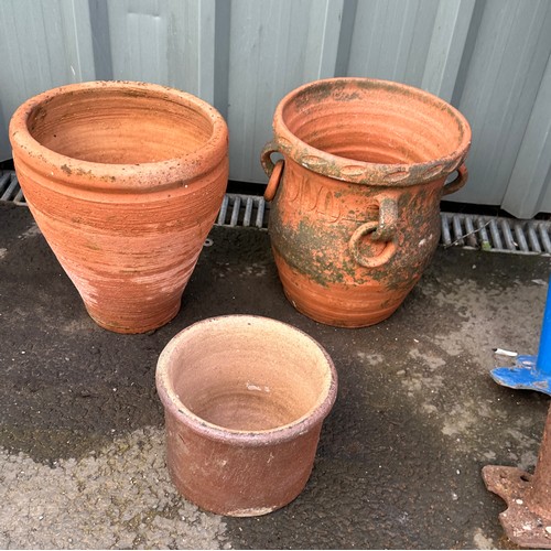 100V - three terracotta plant pots largest measures approx 12 inches tall by 11 inches diameter