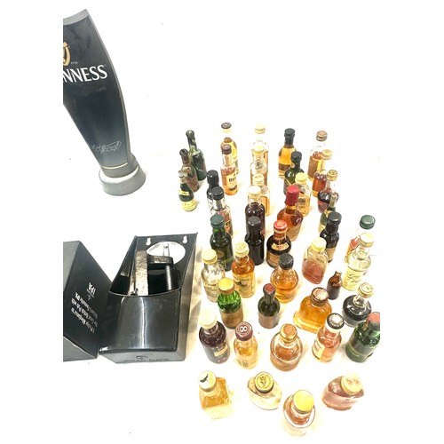 230 - Selection of miniature alcohol bottles along with a Guiness beer pump and other