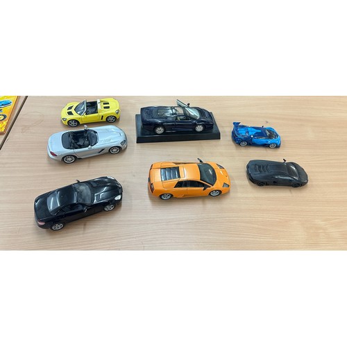 186 - Selection of assorted car figures includes Maisto etc