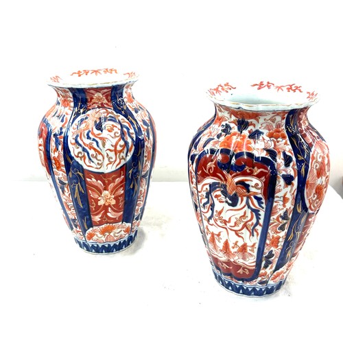 599 - Pair of oriental vases, height 11 inches, a/f