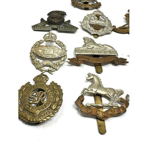 402 - Military Cap Badges x 10 inc. Lancers- Notts & Derby East Lancs