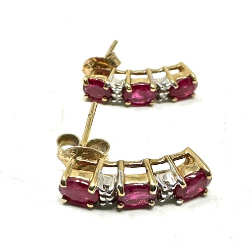 114 - 9ct gold diamond & ruby earrings (1.6g)