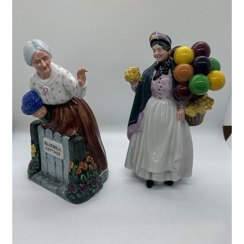 581 - Two vintage Royal Doulton figures ' Bluebell Cottage Thank you' H.N.2732 and ' Biddy Penny Farthing'... 