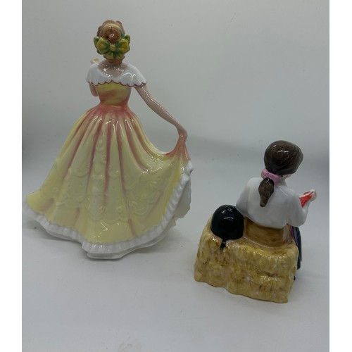 586 - Two vintage Royal Doulton figures ' First Price' HN 3911 and ' Figure of the year 1995 Deborah' HN36... 