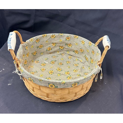 340 - Vintage wicker basket with porcelain handles