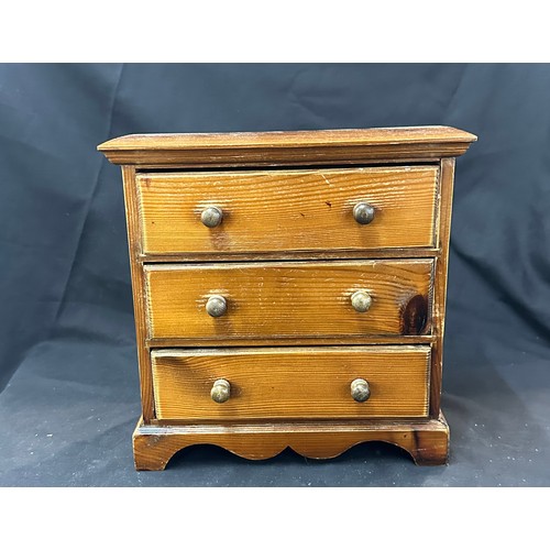 92 - Miniature 3 drawer oak chest measures approximately 12 inches tall 12 inches wide 6 inches depth