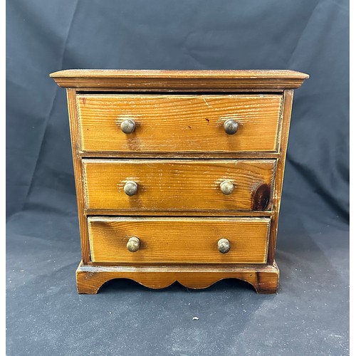 92 - Miniature 3 drawer oak chest measures approximately 12 inches tall 12 inches wide 6 inches depth