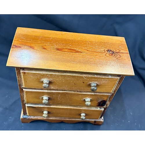 92 - Miniature 3 drawer oak chest measures approximately 12 inches tall 12 inches wide 6 inches depth