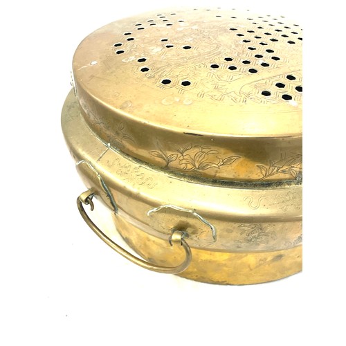 179 - Antique chinese brass pierced 2 handle pot 7 inches tall 15 inches wide