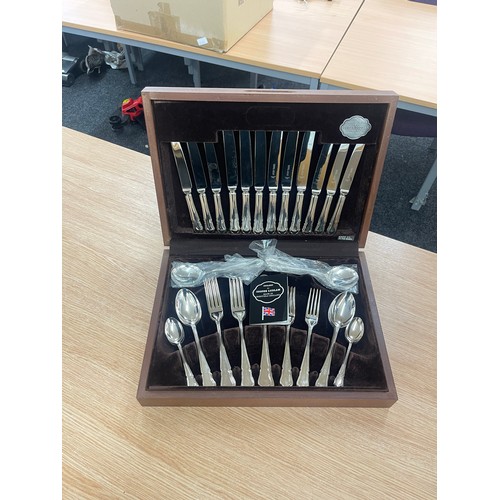 98 - Silver plated canteen of cutlery by Cooper Ludlam, complete never been used