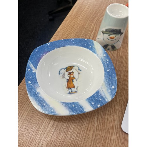 577 - The Snow man pottery, bowl and egg cup