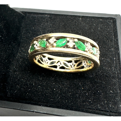 85 - 9ct gold emerald & diamond eternity ring weight 5g 1 stone missing