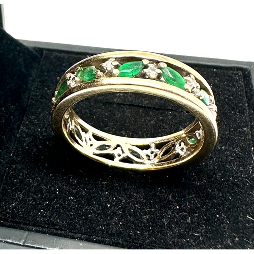 85 - 9ct gold emerald & diamond eternity ring weight 5g 1 stone missing