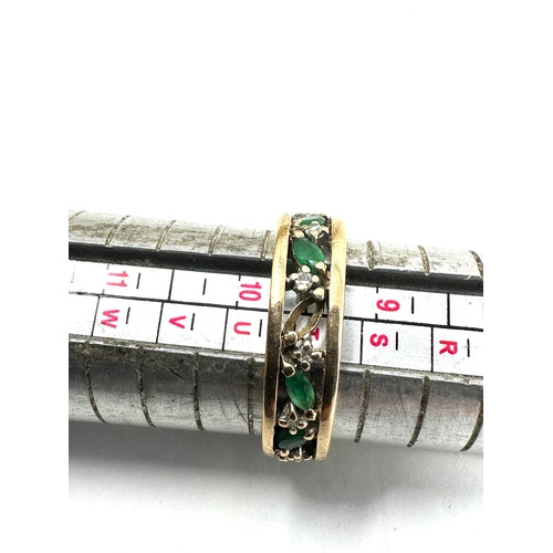 85 - 9ct gold emerald & diamond eternity ring weight 5g 1 stone missing