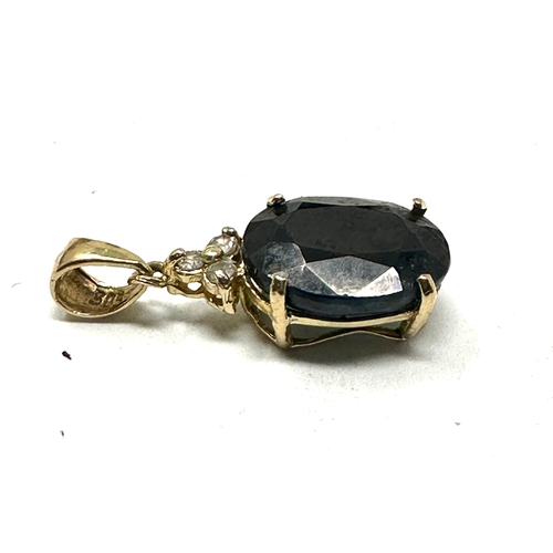 104 - 9ct gold sapphire & diamond pendant weight .09 g