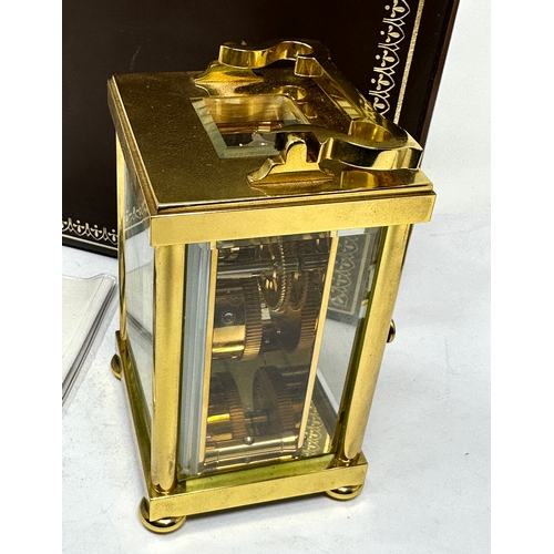 412 - Boxed Matthew Norman brass carriage clock  the clock is ticking complete with the key