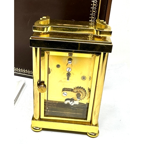 412 - Boxed Matthew Norman brass carriage clock  the clock is ticking complete with the key