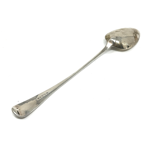 19 - Antique georgian silver basting spoon measures approx 31cm London silver hallmarks weight 130g