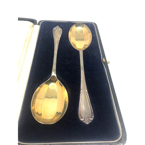 23 - Pair of boxed pearce & sons serving spoons London silver hallmarks silver weight 95g