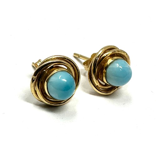 99 - 9ct gold Larimar set rope edged stud earrings (3.6g)