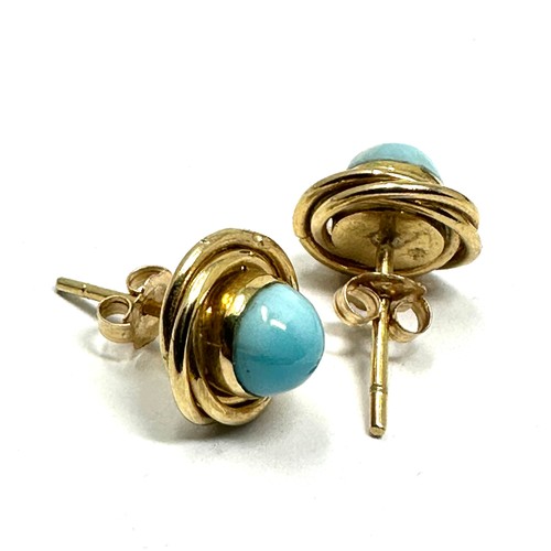 99 - 9ct gold Larimar set rope edged stud earrings (3.6g)