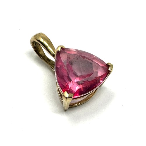 98 - 9ct gold trilliant cut pink coated topaz enhancer pendant (2.5g)