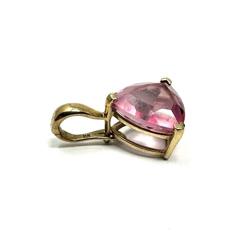 98 - 9ct gold trilliant cut pink coated topaz enhancer pendant (2.5g)