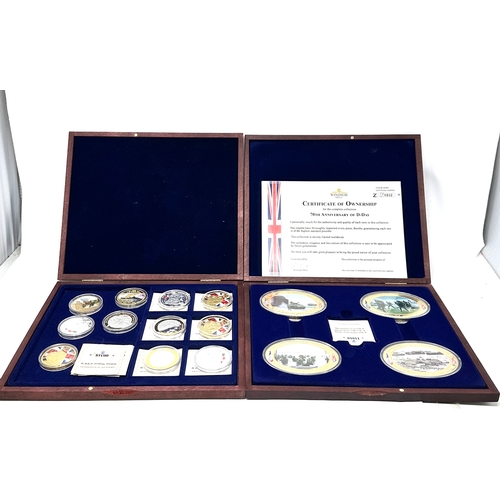 655 - 2 Boxed Collection of Windsor Mint d-day & defining moments Coins & plaques with c.o.a and certifica... 